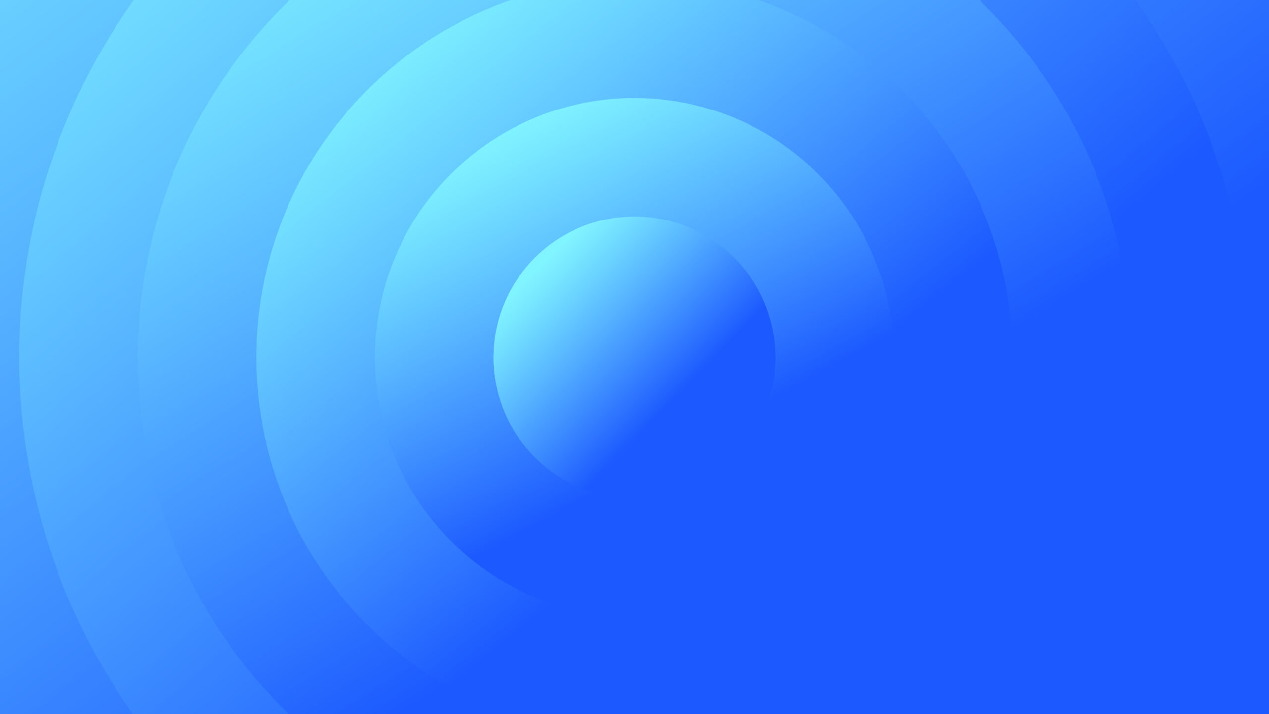 A graphic with concentric circles in varying shades of blue, with the lower right half covered by a solid, brighter blue triangle, creating a modern abstract design.